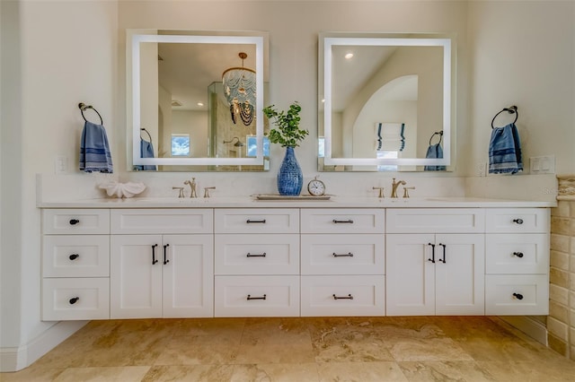 362 41st Ave, St Pete Beach, FL 33706 - bathroom featuring double vanity and a sink