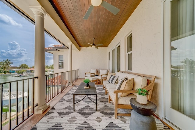 362 41st Ave, St Pete Beach, FL 33706 - balcony featuring outdoor lounge area and ceiling fan