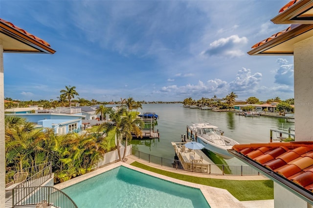 362 41st Ave, St Pete Beach, FL 33706 - view of swimming pool with a water view, a boat dock, and fence private yard