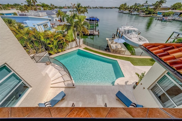 362 41st Ave, St Pete Beach, FL 33706 - view of pool featuring a fenced backyard, a fenced in pool, a water view, and a patio area