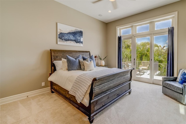 362 41st Ave, St Pete Beach, FL 33706 - bedroom featuring light carpet, baseboards, a ceiling fan, and access to outside