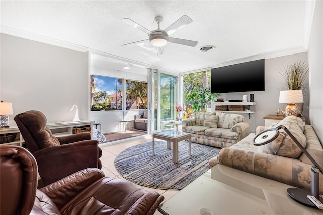 615 10th Ave NE Unit 1, Saint Petersburg, FL 33701 - living room featuring crown molding, light tile patterned floors, floor to ceiling windows, ceiling fan, and visible vents
