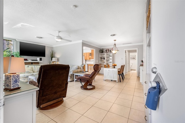 615 10th Ave NE Unit 1, Saint Petersburg, FL 33701 - living area with light tile patterned flooring, a textured ceiling, visible vents, ornamental molding, and a ceiling fan