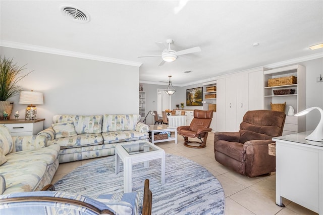 615 10th Ave NE Unit 1, Saint Petersburg, FL 33701 - living area with crown molding, ceiling fan, visible vents, and light tile patterned floors
