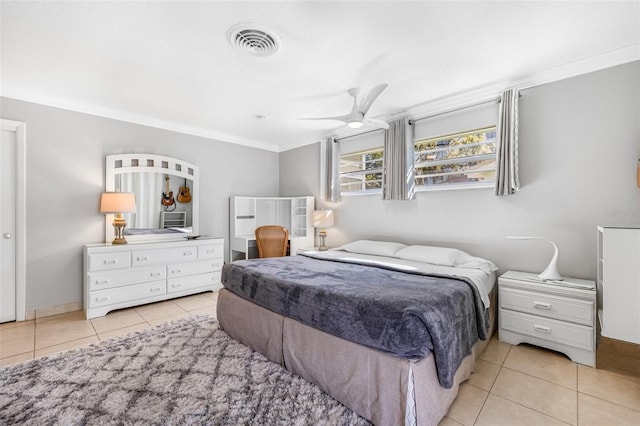 615 10th Ave NE Unit 1, Saint Petersburg, FL 33701 - bedroom featuring baseboards, visible vents, crown molding, and tile patterned flooring