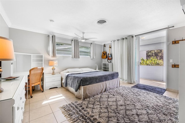 615 10th Ave NE Unit 1, Saint Petersburg, FL 33701 - bedroom featuring visible vents, crown molding, light tile patterned floors, and access to outside