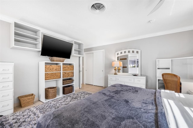 615 10th Ave NE Unit 1, Saint Petersburg, FL 33701 - tiled bedroom featuring ornamental molding and visible vents