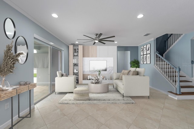 living area featuring a ceiling fan, stairs, baseboards, visible vents, and recessed lighting