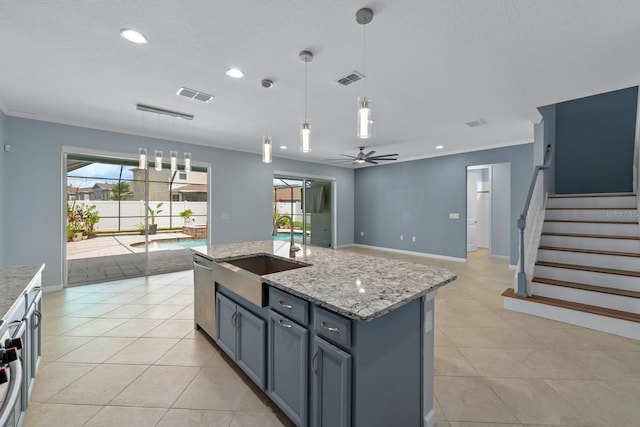 kitchen featuring stainless steel dishwasher, a sink, visible vents, recessed lighting, and light stone countertops