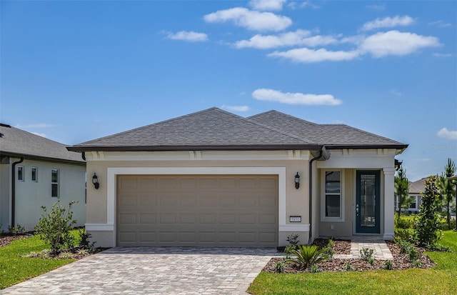 5831 SW 87th Ave, Ocala, FL 34481 - single story home featuring stucco siding, a garage, and decorative driveway