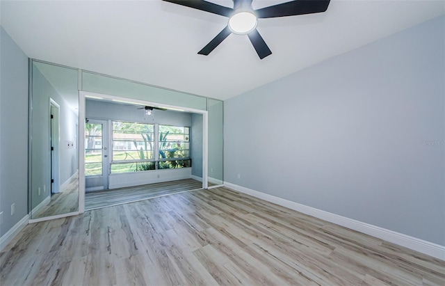 3143 Mission Grove Dr, Palm Harbor, FL 34684 - unfurnished room with ceiling fan, baseboards, and wood finished floors