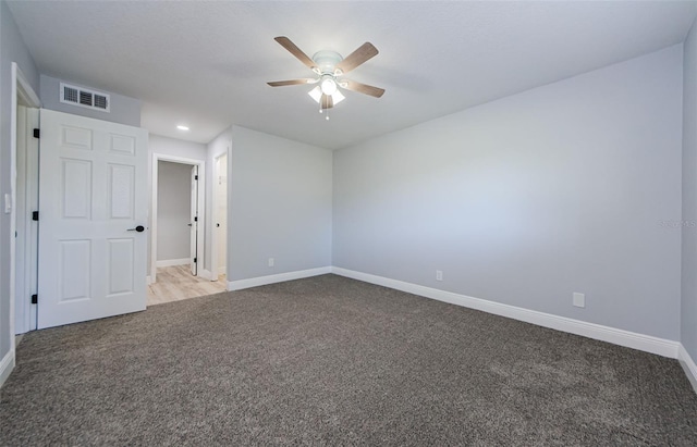 3143 Mission Grove Dr, Palm Harbor, FL 34684 - unfurnished bedroom featuring visible vents, baseboards, recessed lighting, and carpet