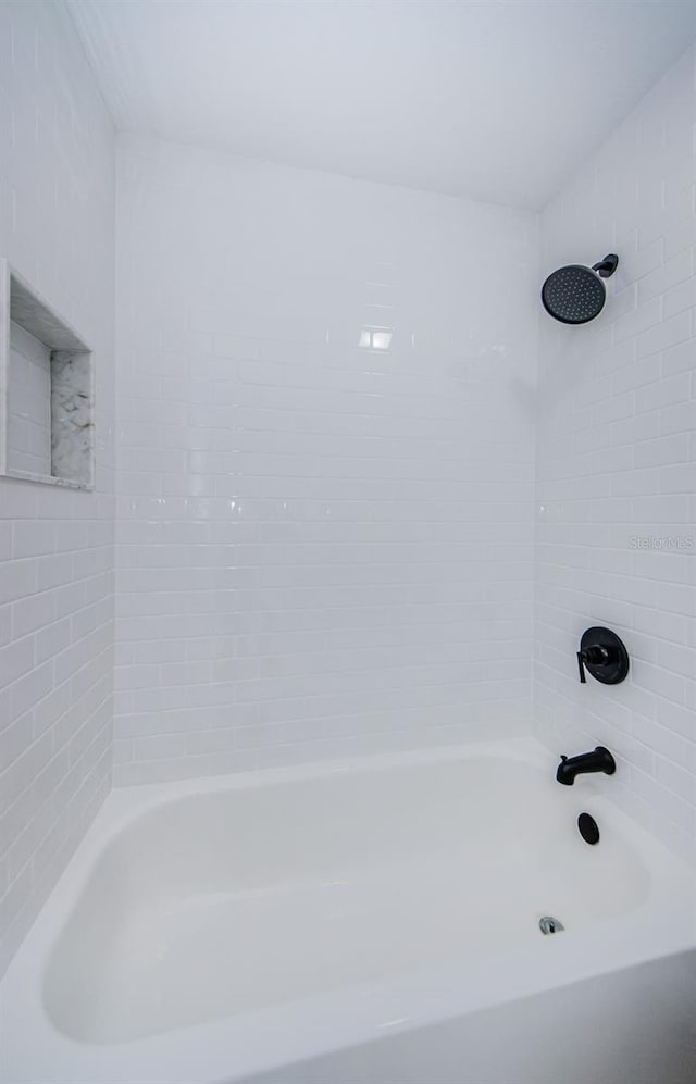3143 Mission Grove Dr, Palm Harbor, FL 34684 - bathroom featuring shower / bathtub combination