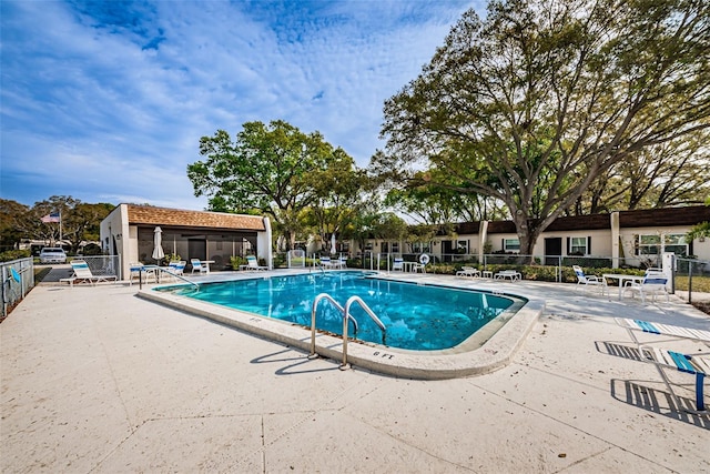 3143 Mission Grove Dr, Palm Harbor, FL 34684 - pool featuring fence and a patio
