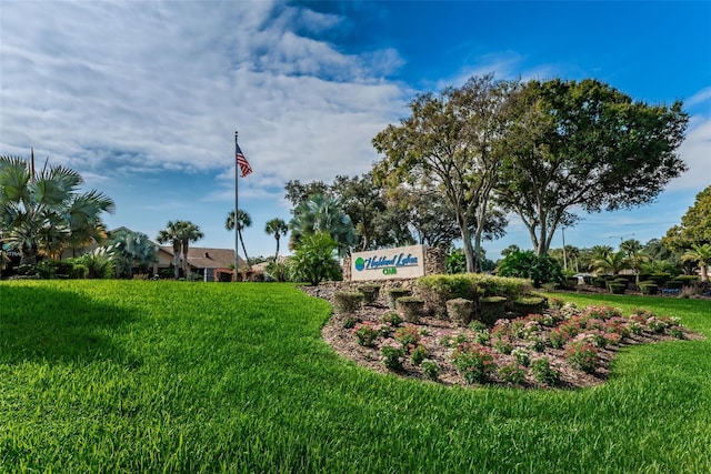 3143 Mission Grove Dr, Palm Harbor, FL 34684 - community / neighborhood sign featuring a lawn