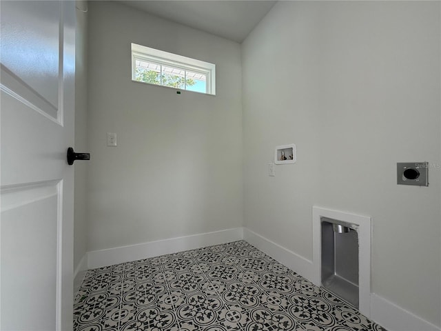 5235 9th Ave N, Saint Petersburg, FL 33710 - clothes washing area with hookup for an electric dryer, laundry area, tile patterned floors, baseboards, and hookup for a washing machine
