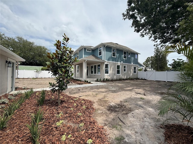 5235 9th Ave N, Saint Petersburg, FL 33710 - back of house featuring a fenced backyard and stucco siding