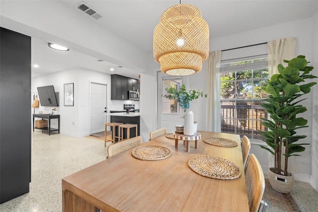 dining area featuring light speckled floor, recessed lighting, baseboards, and visible vents