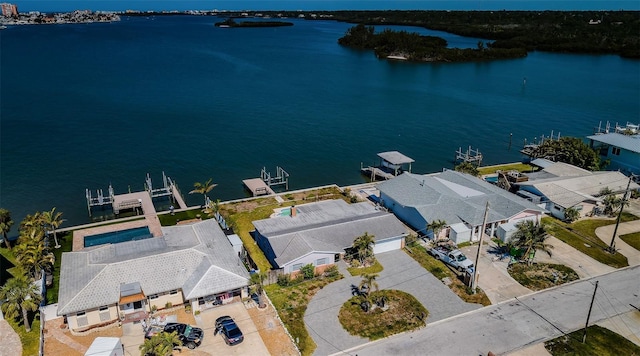 bird's eye view featuring a residential view and a water view