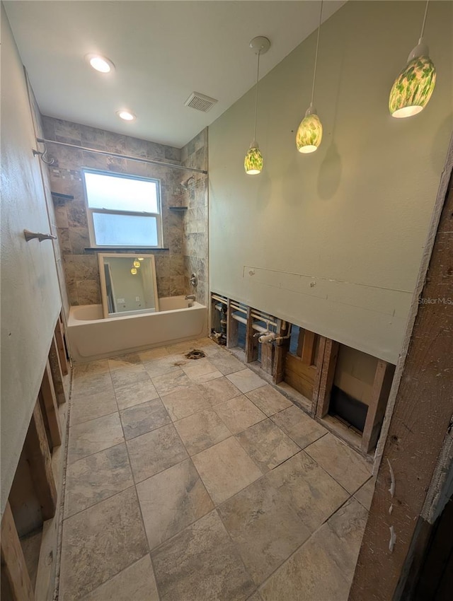 bathroom featuring recessed lighting, shower / bath combination, and visible vents