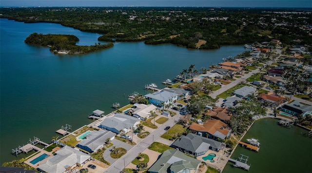 aerial view with a residential view and a water view
