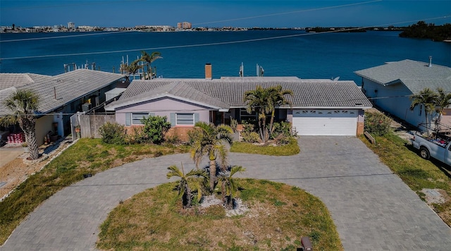 exterior space with a water view