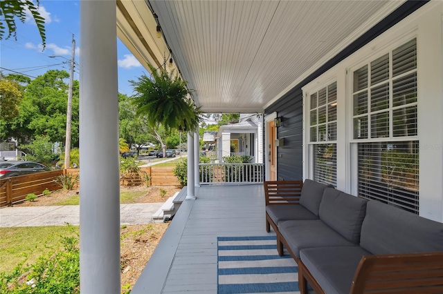 view of patio / terrace featuring a porch and outdoor lounge area