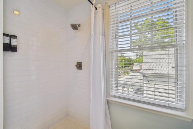 bathroom featuring a stall shower