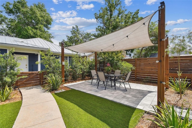 view of patio with fence