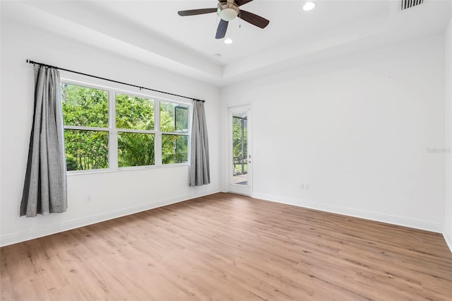 30900 Spruceberry Ct, Wesley Chapel, FL 33543 - spare room with wood finished floors, ceiling fan, baseboards, and recessed lighting