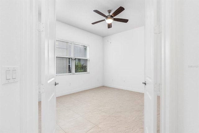 30900 Spruceberry Ct, Wesley Chapel, FL 33543 - empty room featuring baseboards and a ceiling fan