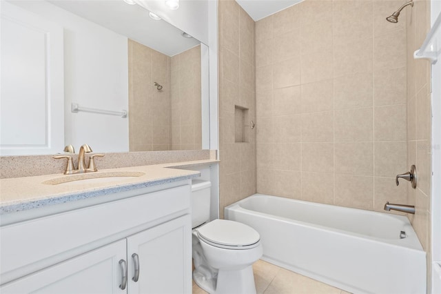 30900 Spruceberry Ct, Wesley Chapel, FL 33543 - full bath featuring toilet, tile patterned floors, vanity, and shower / bath combination