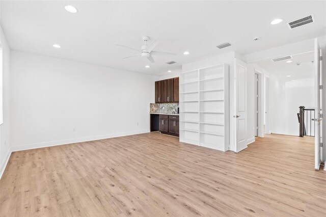 30900 Spruceberry Ct, Wesley Chapel, FL 33543 - unfurnished living room featuring visible vents, light wood-style flooring, recessed lighting, and ceiling fan