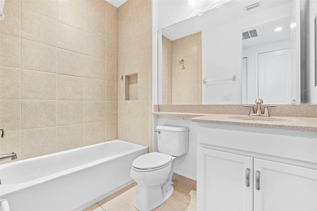 30900 Spruceberry Ct, Wesley Chapel, FL 33543 - full bathroom with vanity, tile patterned flooring, toilet, shower / bathtub combination, and visible vents
