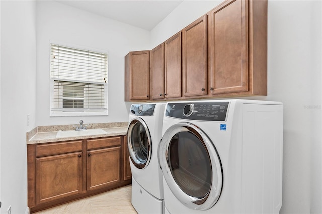 30900 Spruceberry Ct, Wesley Chapel, FL 33543 - clothes washing area with washing machine and clothes dryer, a sink, and cabinet space