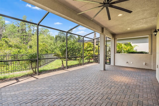 30900 Spruceberry Ct, Wesley Chapel, FL 33543 - view of patio / terrace featuring fence, glass enclosure, and a ceiling fan
