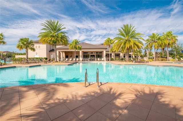 30900 Spruceberry Ct, Wesley Chapel, FL 33543 - community pool with a patio