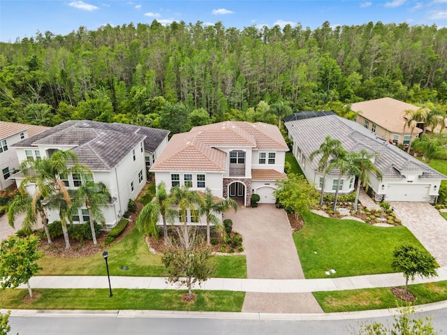 30900 Spruceberry Ct, Wesley Chapel, FL 33543 - aerial view with a forest view