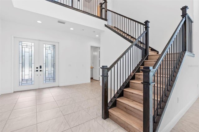 30900 Spruceberry Ct, Wesley Chapel, FL 33543 - foyer featuring recessed lighting, stairway, visible vents, and baseboards