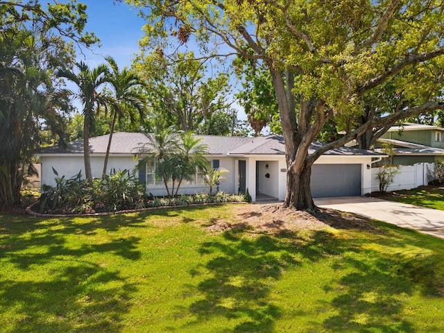 1666 N Dakota Ave NE, Saint Petersburg, FL 33703 - single story home with concrete driveway and a front yard
