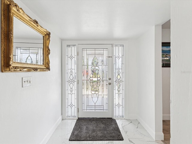 1666 N Dakota Ave NE, Saint Petersburg, FL 33703 - entryway with marble finish floor and baseboards