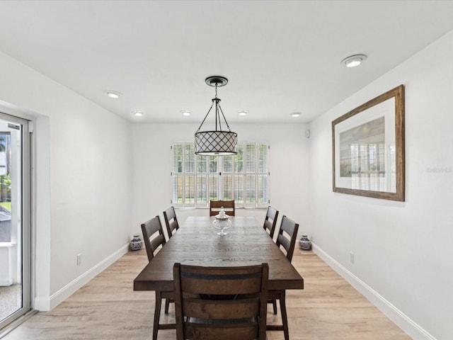 1666 N Dakota Ave NE, Saint Petersburg, FL 33703 - dining space featuring baseboards, light wood-style flooring, and recessed lighting