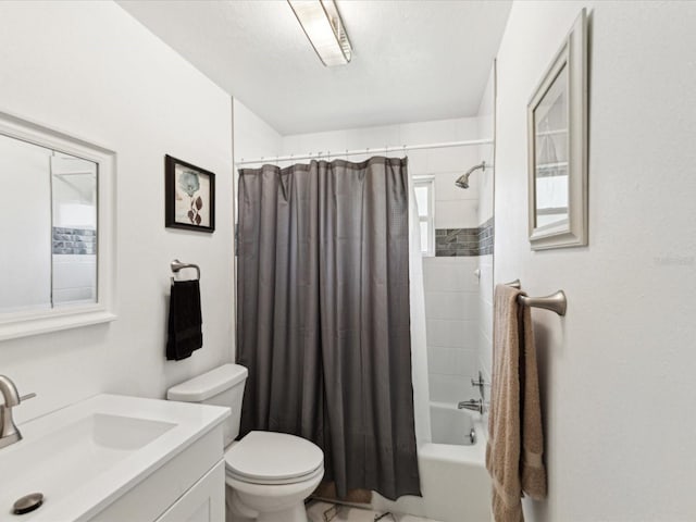 1666 N Dakota Ave NE, Saint Petersburg, FL 33703 - bathroom featuring shower / bath combination with curtain, toilet, and vanity