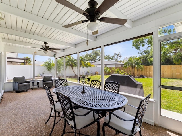 1666 N Dakota Ave NE, Saint Petersburg, FL 33703 - sunroom / solarium with outdoor dining space, beamed ceiling, and ceiling fan