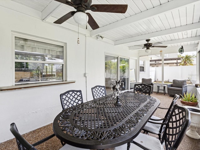 1666 N Dakota Ave NE, Saint Petersburg, FL 33703 - view of patio with a ceiling fan, fence, and outdoor dining space