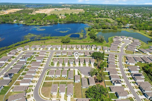 aerial view featuring a residential view and a water view