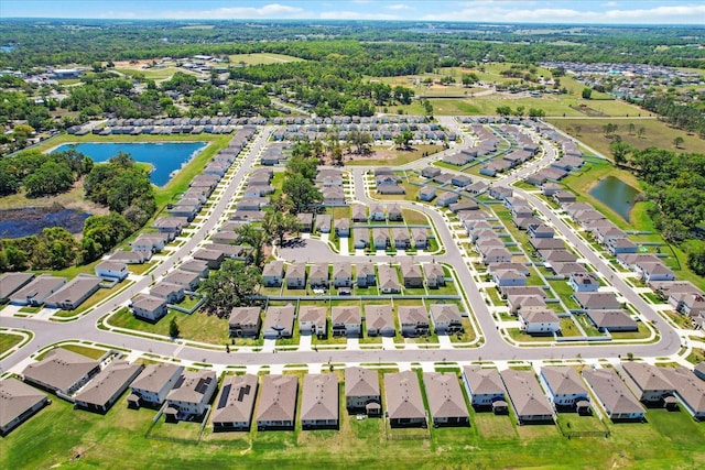aerial view with a residential view and a water view
