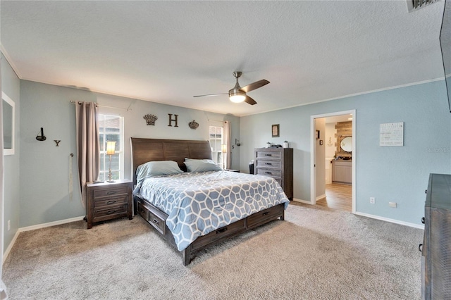 bedroom with light colored carpet, baseboards, ornamental molding, and visible vents