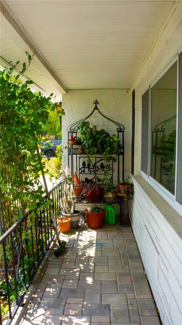 balcony featuring a porch
