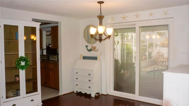 interior space with a notable chandelier